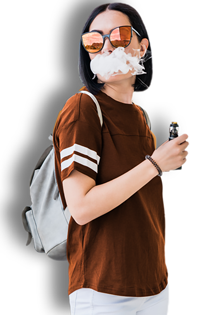 A lady in brown shirt smoking and holding a vape.